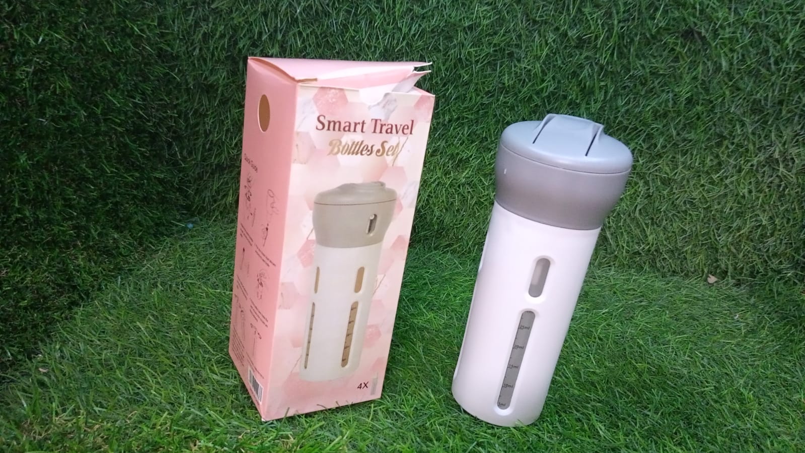 The four inner bottles from the 4-in-1 travel kit shown outside the main casing.