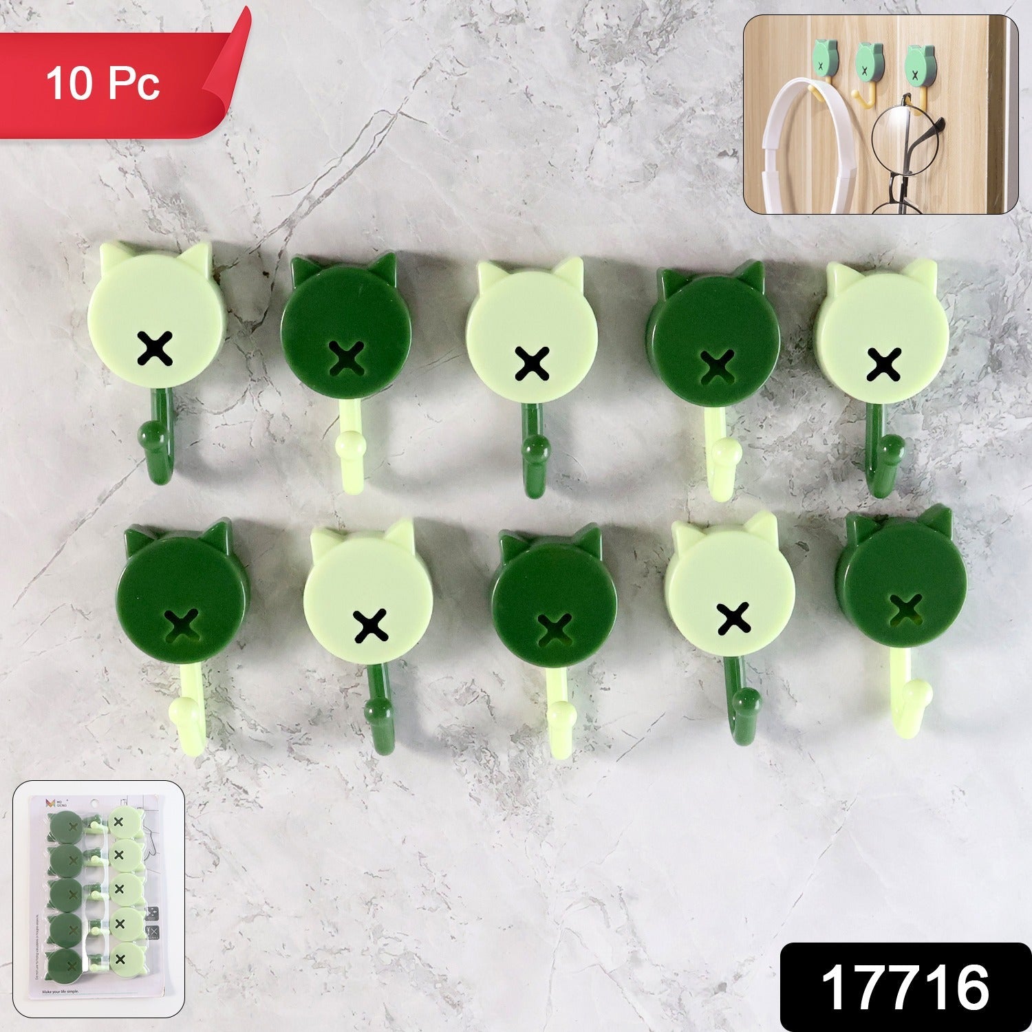 Self adhesive wall hooks holding keys and cables securely on a tile surface