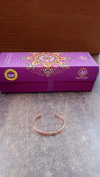 Close up of rose gold-plated open cuff bracelet design