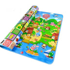 The double-sided baby play mat folded neatly with its carrying bag for easy portability.