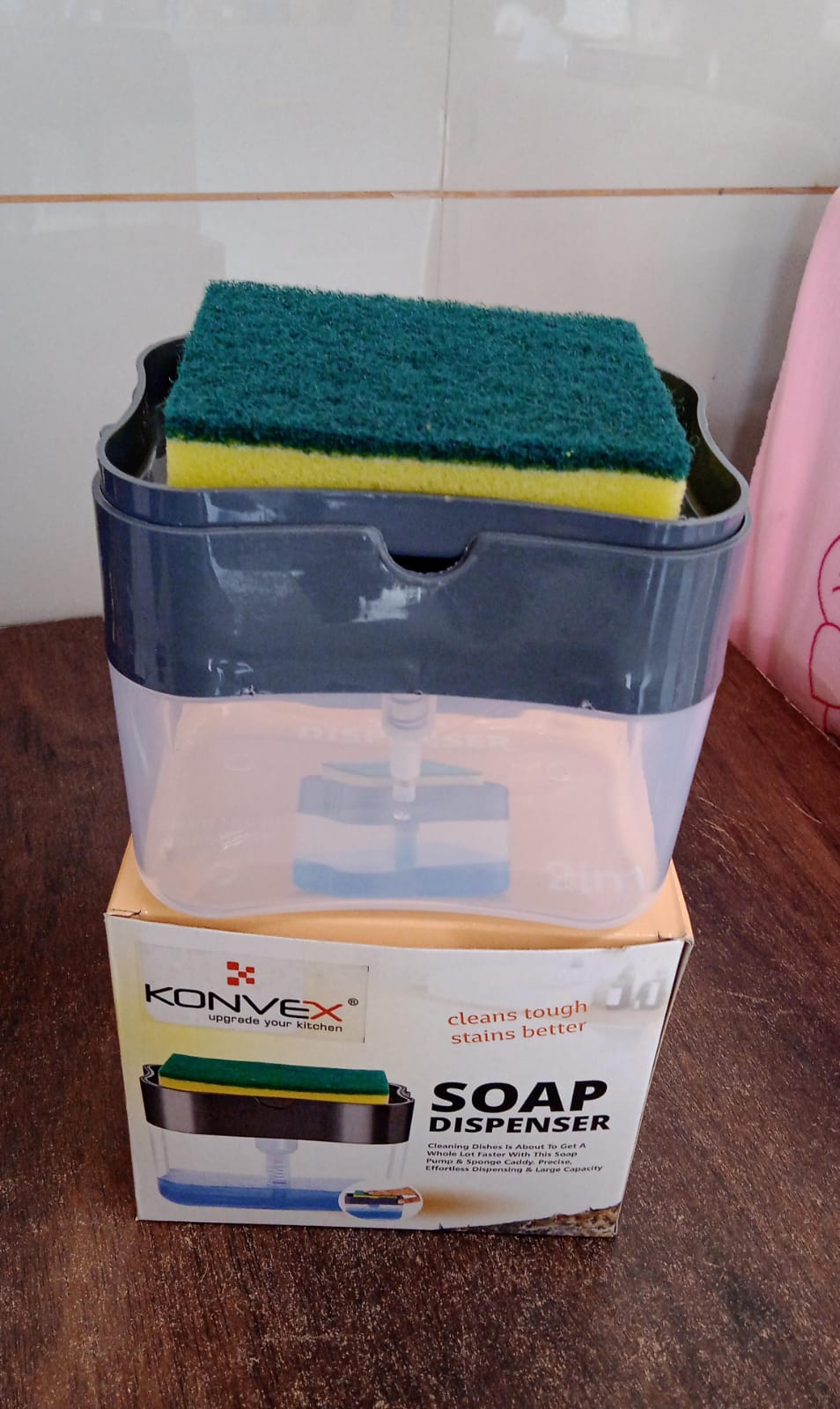 An empty Konvex 2-in-1 soap dispenser, highlighting its simple and functional design.