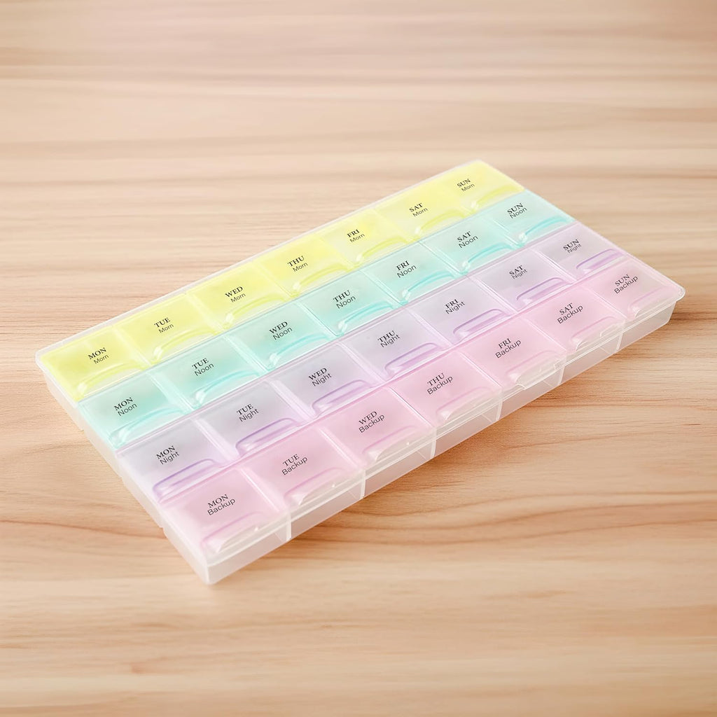 Portable pill organizer showcasing clear compartments and easy-open lids for daily use.