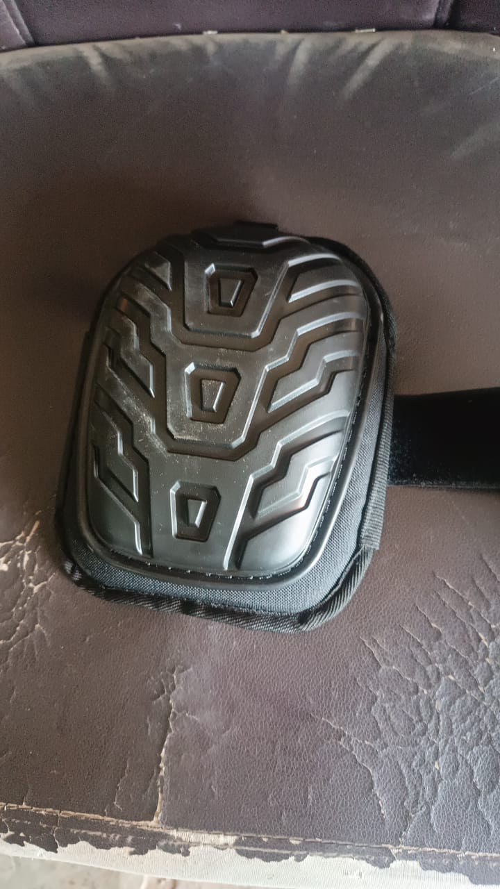 Heavy-duty knee pad displayed upright showcasing its protective shell and padding