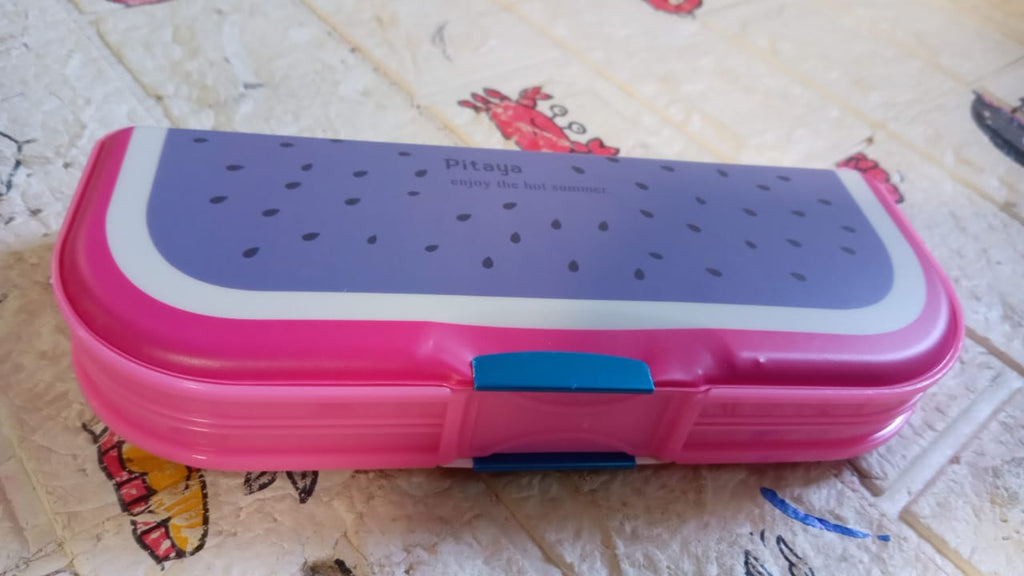 Top view of a cartoon printed pencil case with two organized compartments.