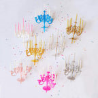 Overhead shot of the luxury birthday candles and stand, designed to be perfect cake toppers for any celebration.