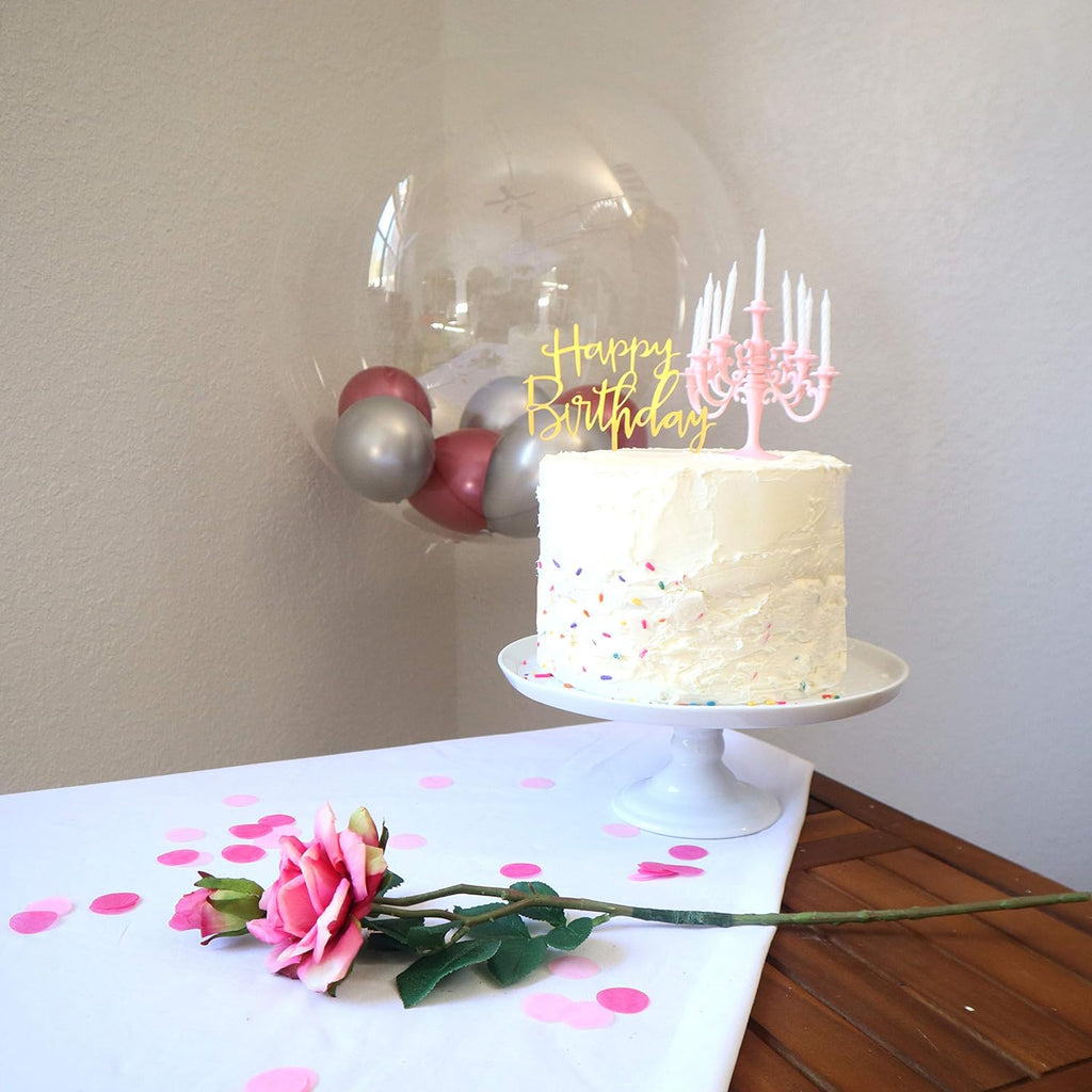 The luxury birthday candle set arranged beautifully on a cake, acting as an eye-catching topper for special events.