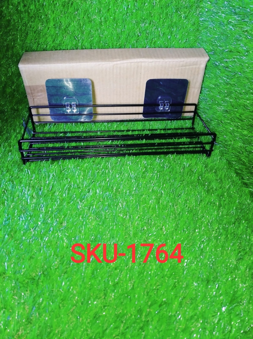 Lifestyle image of the versatile wall mount bathroom shelf.