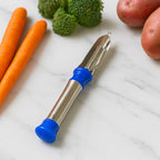 Indo Glow Stainless Steel Vegetable Peeler with dual sharp blades on a white background.