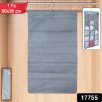 Open multi-pocket hanging under garment organizer inside a closet