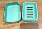 Stacked aqua green soap cases ideal for travel and home bathrooms