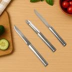 Cisora 3-piece stainless steel kitchen knife set laid out on a white background
