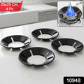 Gas stove flame protector ring fitted on burner for improved flame control