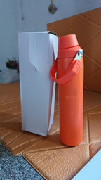 Side view of insulated stainless steel water bottle showing sleek design