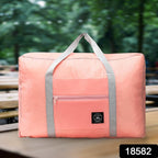 Detail of the waterproof fabric on the blue travel bag, showcasing its texture.