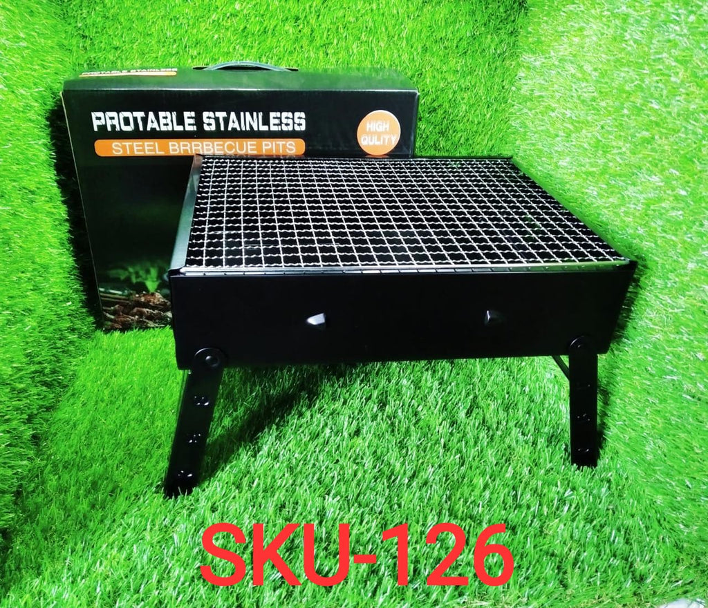 Siplix folding charcoal grill in use, cooking delicious food outdoors.