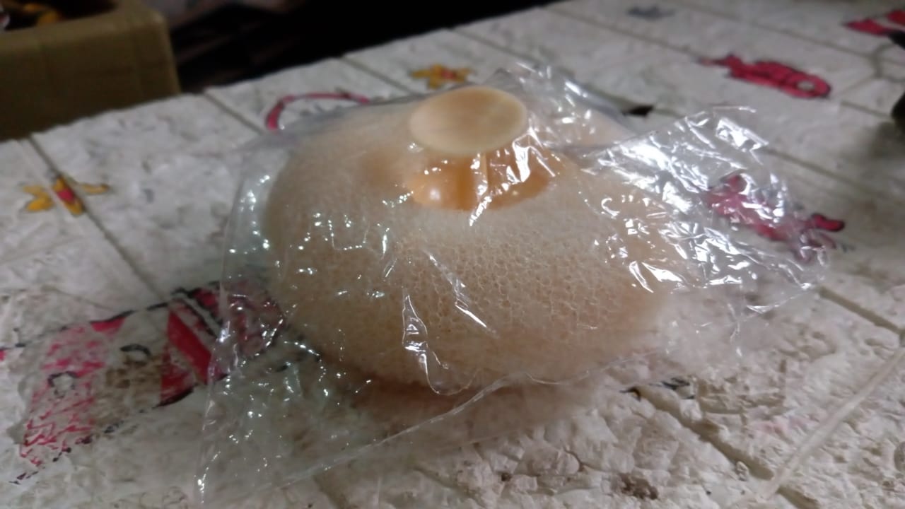VelvaBloom flower bath sponge in its elegant packaging, ready for delivery.