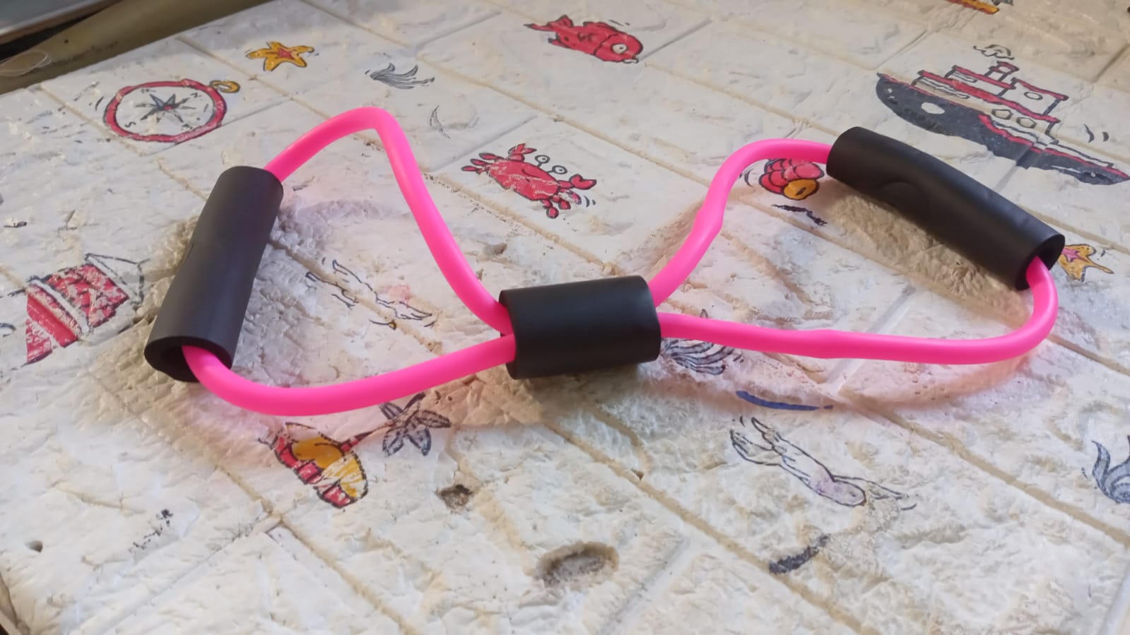 A single resistance loop band used for exercise, yoga, and comprehensive strength training.