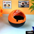 Compact ball-shaped portable ashtray ideal for patio and car use
