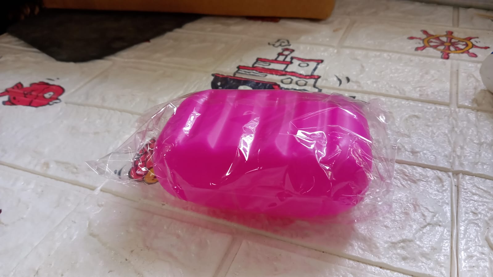 The Travel Soap Box displayed with other travel essentials, ready for packing.