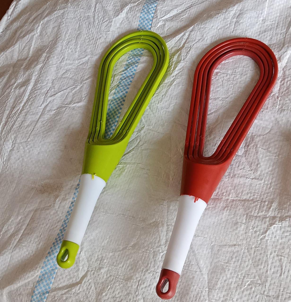 Close-up view of the durable plastic balloon whisk from Quickslice.