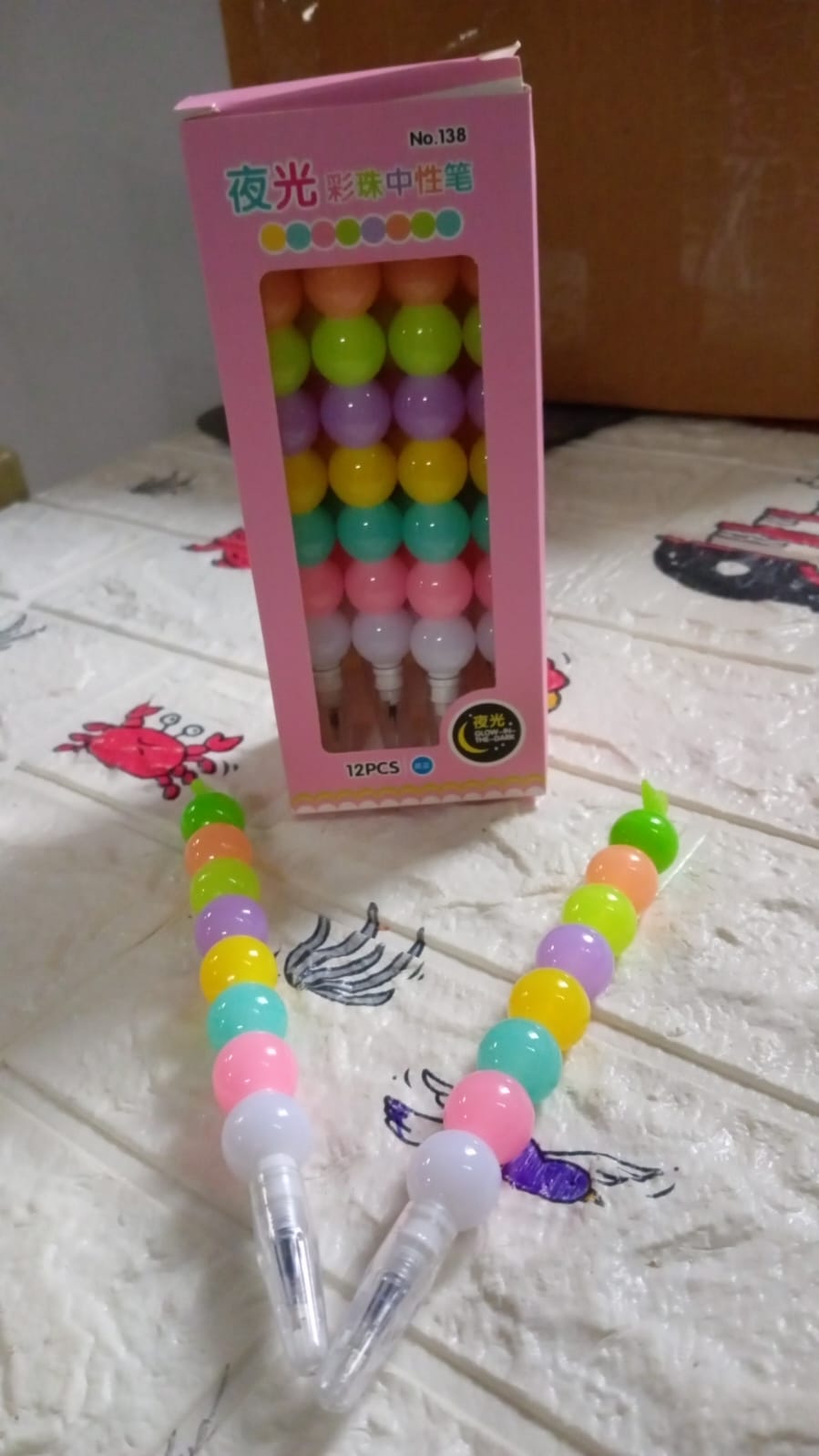 Cute pearl gel pens set with a playful arrangement, designed to inspire young artists and writers.