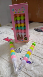 Cute pearl gel pens set with a playful arrangement, designed to inspire young artists and writers.