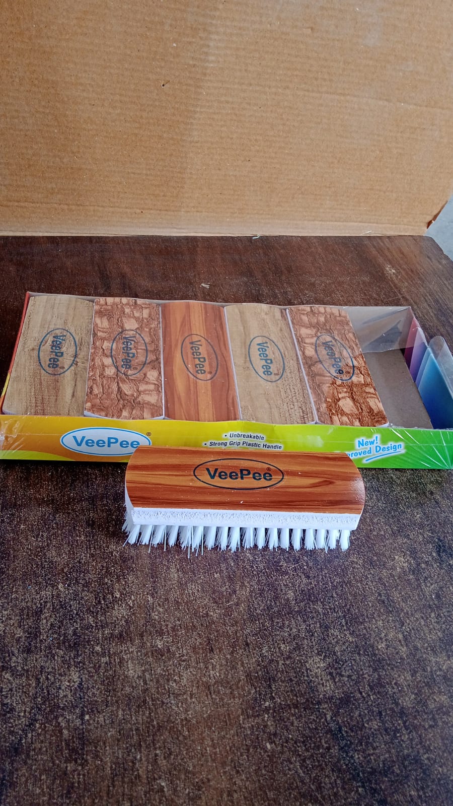 6 piece cleaning brush set with assorted printed tops and nylon bristles