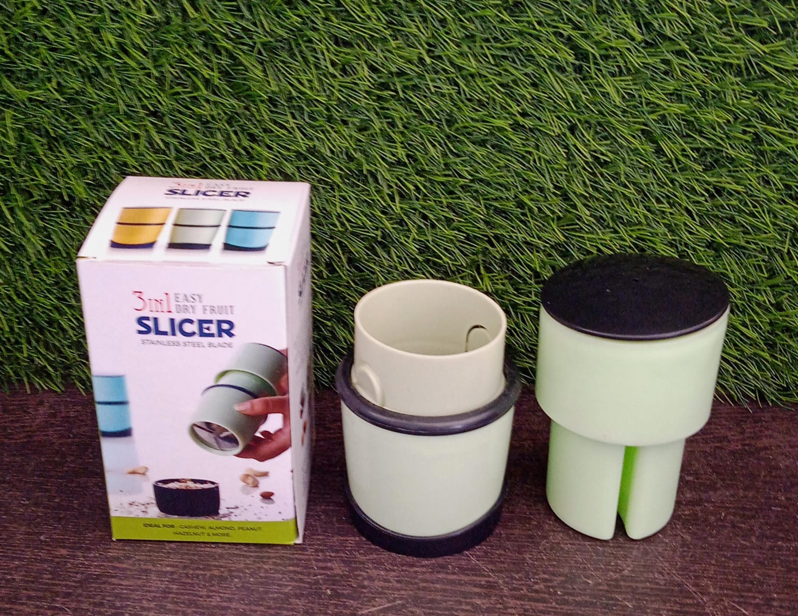 Collection of multicolor grinder and slicer kitchen tools.