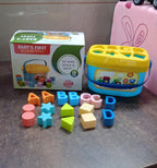 Packaging of the Baby Shape Sorter Toy, highlighting its educational benefits.