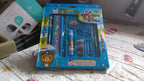 Compact stationery kit with safety scissors and a functional pencil sharpener.
