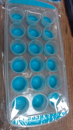 Smart push out round silicone mold for creating ice cubes or mini chocolates.