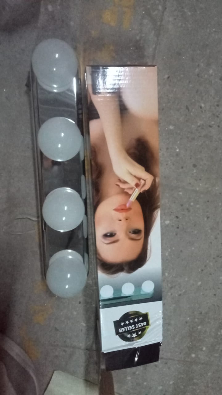 Versatile portable makeup light providing optimal illumination for cosmetic tasks.