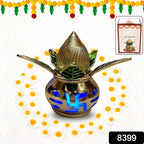 Close-up of a decorative LED Kalash with intricate gold plating on a festive background.