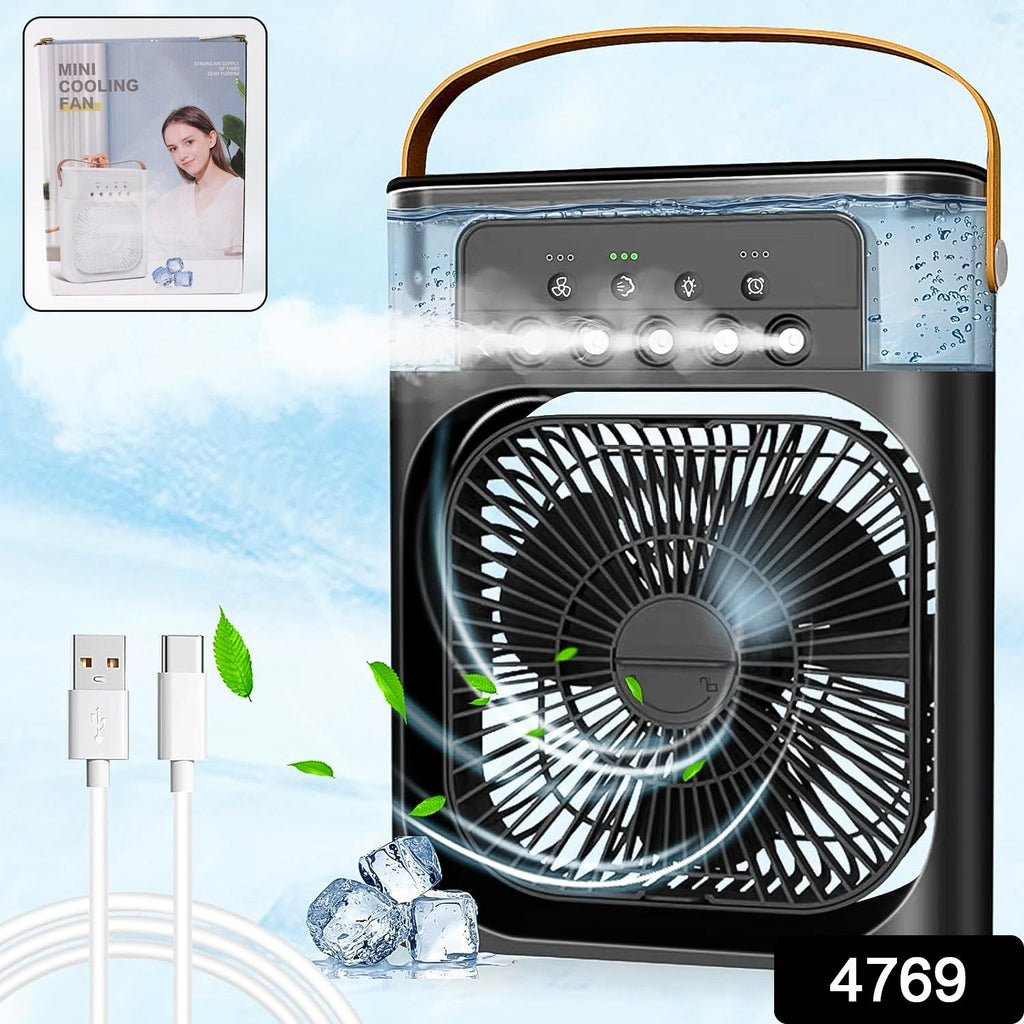 USB-powered portable fan connected to a laptop for personal cooling.