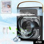 USB-powered portable fan connected to a laptop for personal cooling.