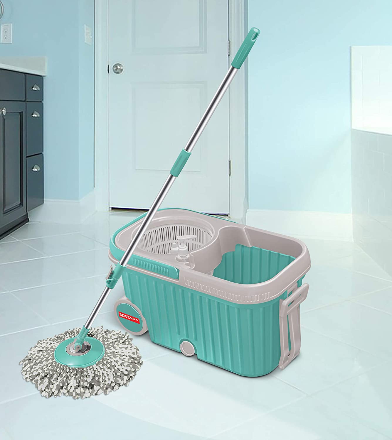 Ganesh 360 Spin Mop with Wheels, showcasing auto-fold handle and microfiber head.