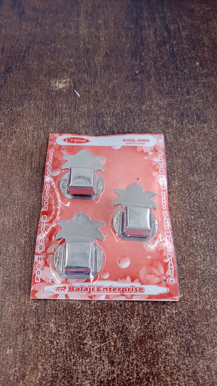 Wall-mounted incense stick holders arranged for easy use in prayer corner.