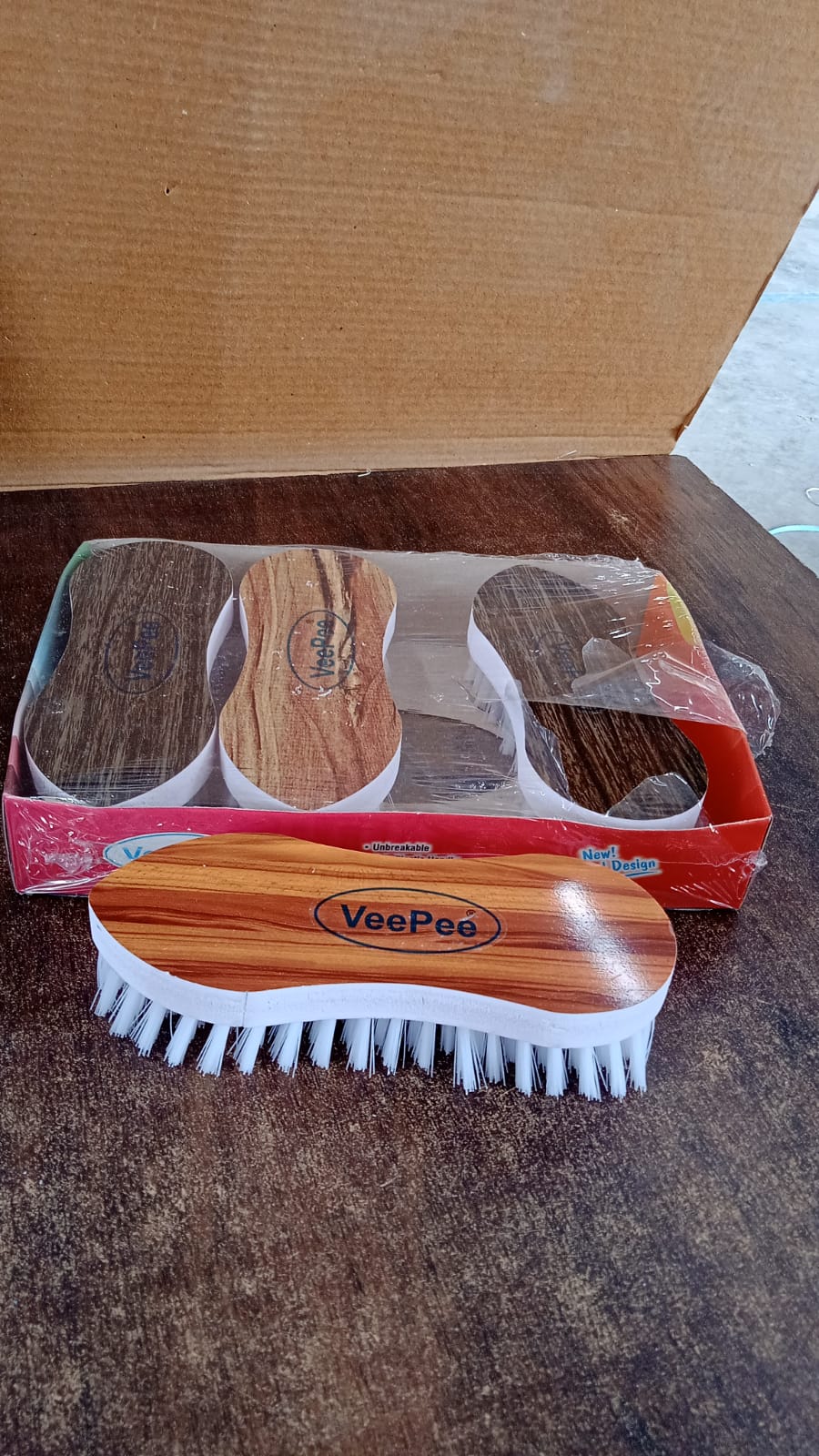 Close-up of durable plastic laundry brush with medium-hard nylon bristles