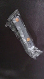 Another angle showing the minimalist design of the silicone phone finger holder grip strip.