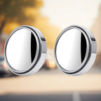 Silver round blind spot mirror on vehicle side mirror