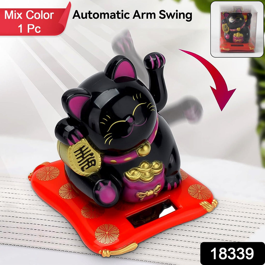 Close-up of the smiling Waving Lucky Cat with its arm waving automatically.