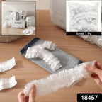 Clear plastic cover draped over an armchair for dust protection.