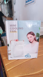 Portable Air Conditioner Fan used at an outdoor picnic for personal comfort.
