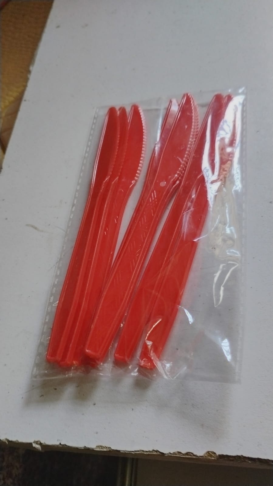 Close up of serrated blade on sturdy plastic knife for efficient cutting