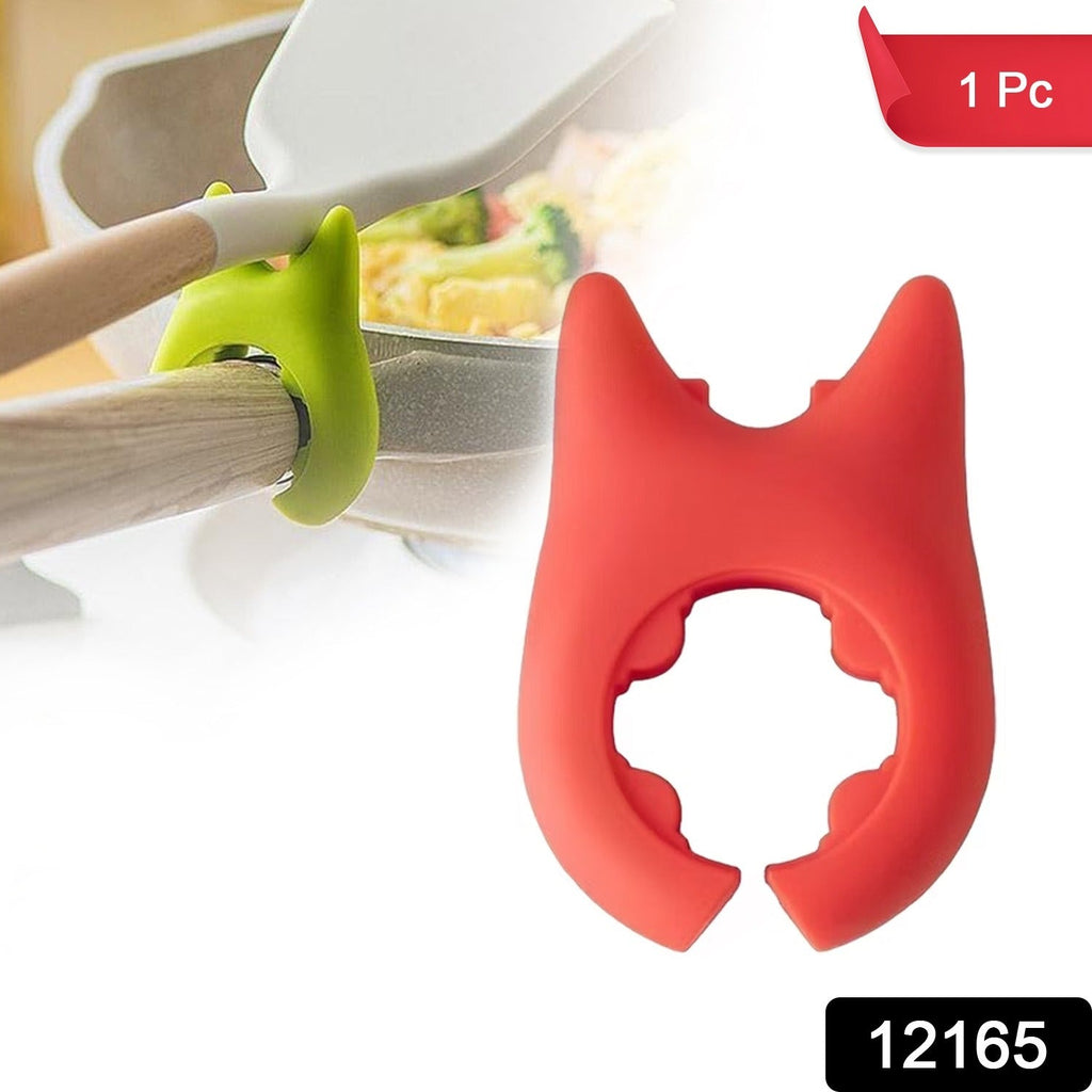 Heat-resistant plastic pot holder with cat ear design holding kitchen utensils securely