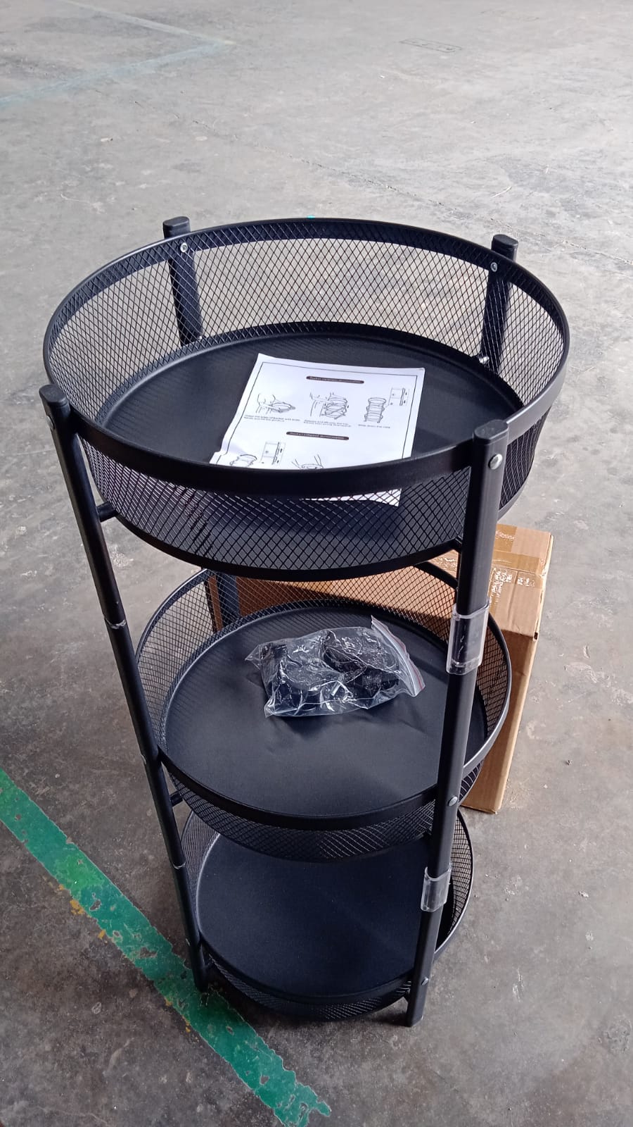 Compact tall metal mesh storage trolley ideal for small spaces
