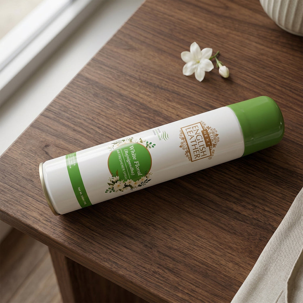 User spraying premium air freshener into indoor room for freshness