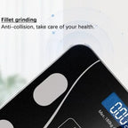 Compact smart body composition scale with durable tempered glass surface.