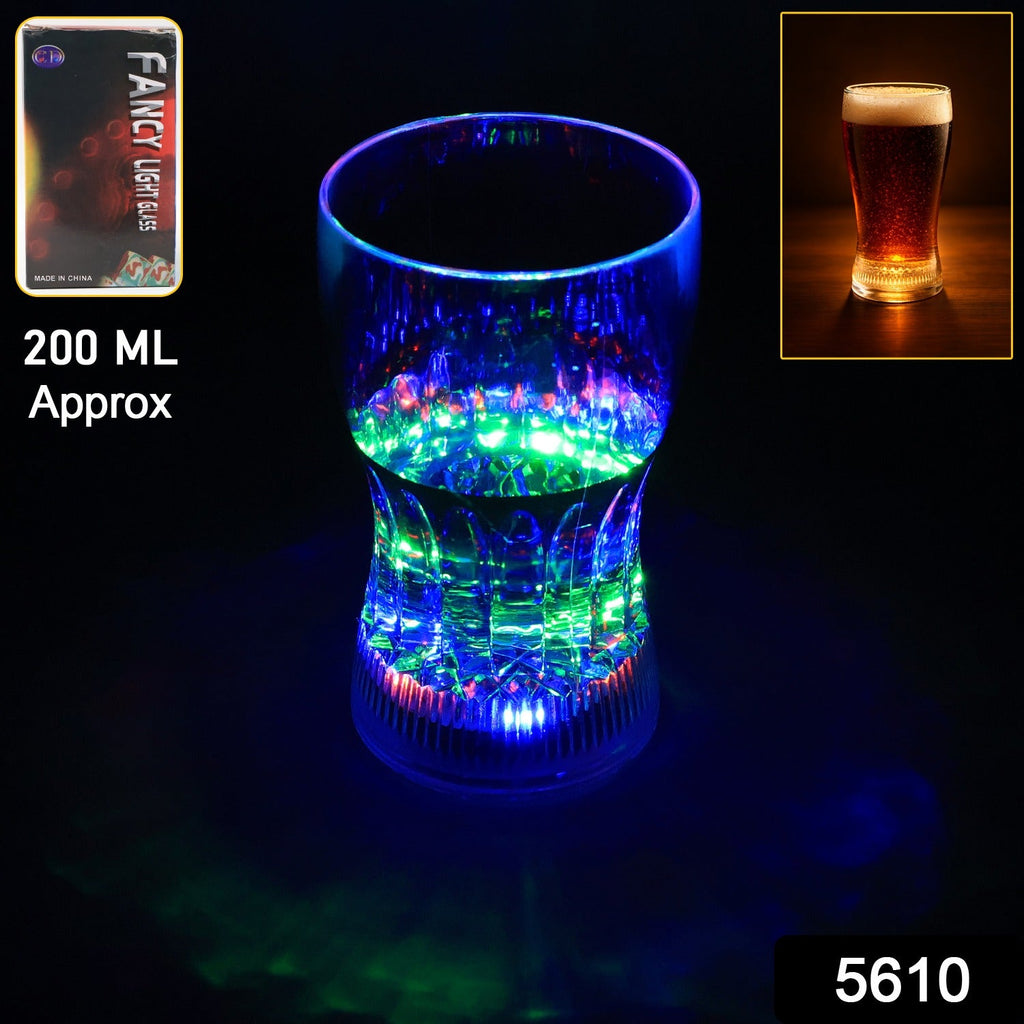 Multiple color changing LED party cups glowing brightly at a festive event.