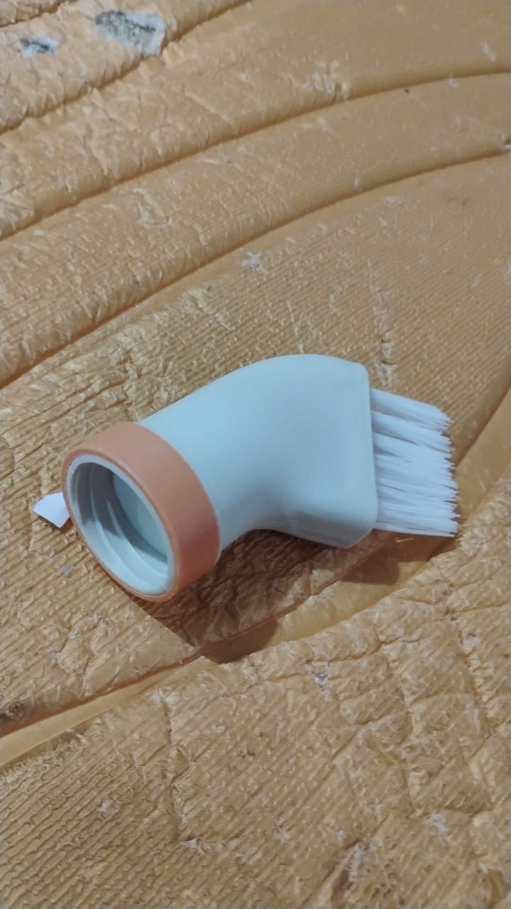 Multipurpose cleaning brush packaged and ready for sale